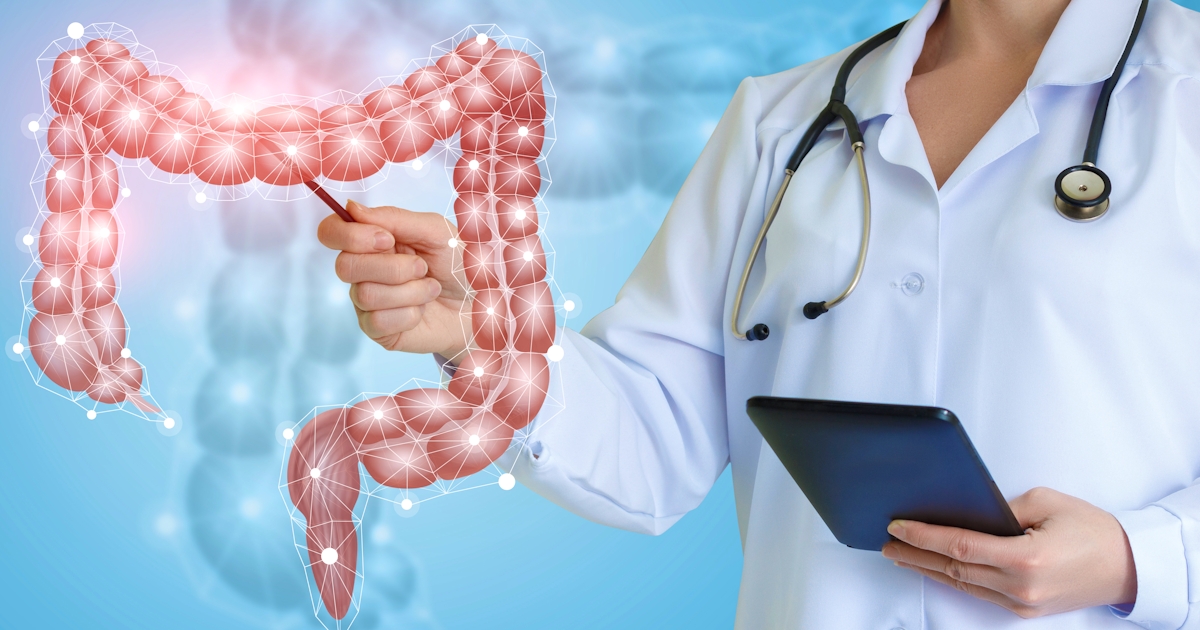 Doctor shows colon on virtual screen .