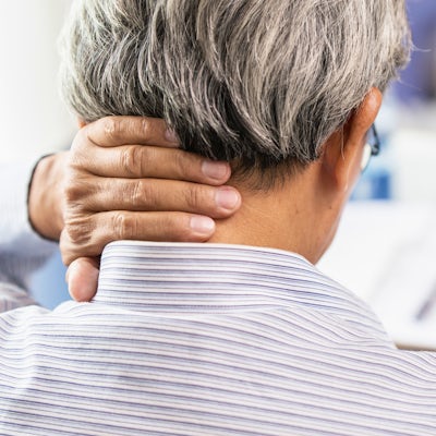 back of the neck elderly male left hand on back of neck
