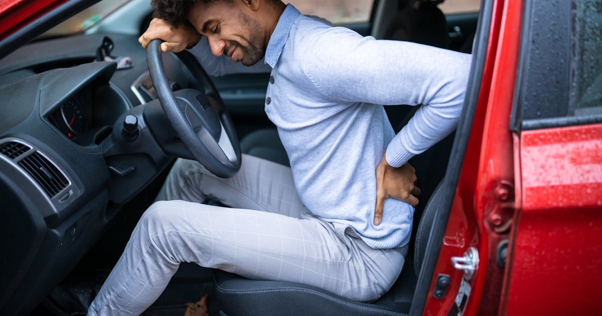 male driver suffering with back pain