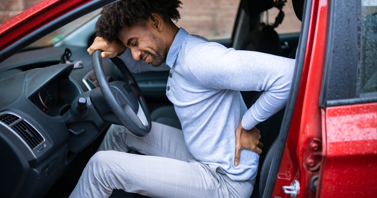 male driver suffering with back pain