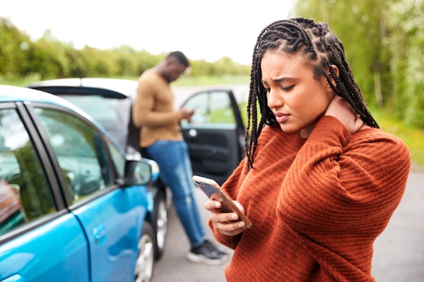 Female Motorist Involved In Car Accident Calling I