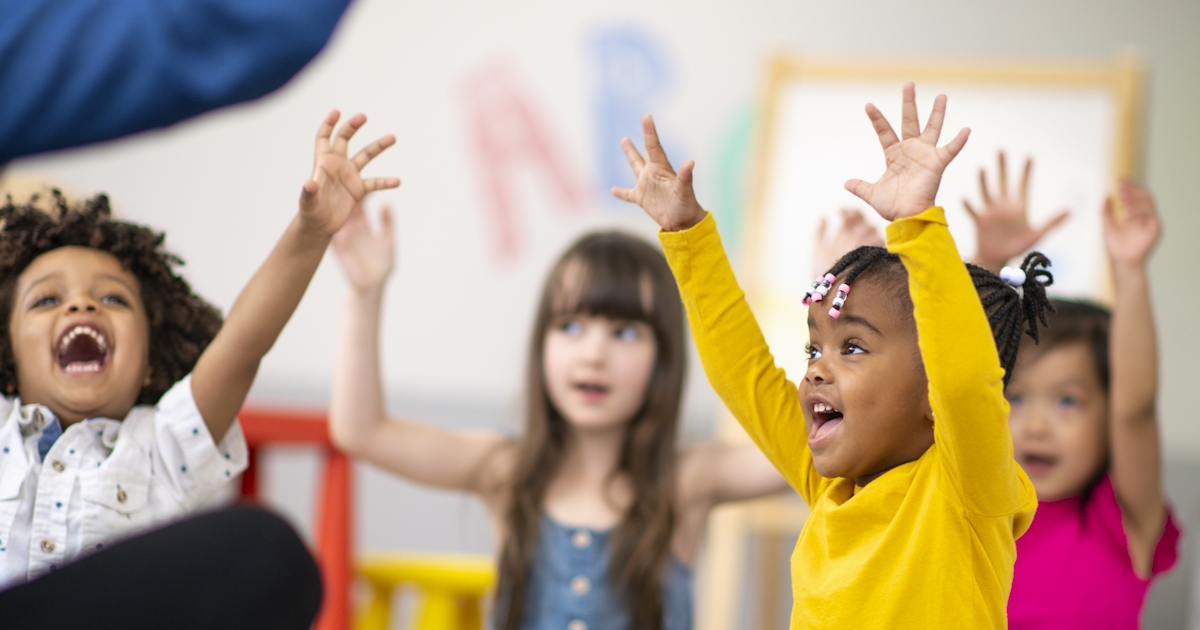 Multi-ethnic group of preschool students in class