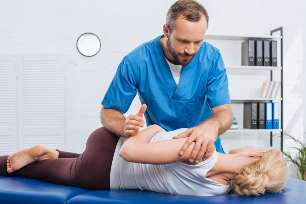 Chiropractor showing Key Facts About the Chiropractic Profession