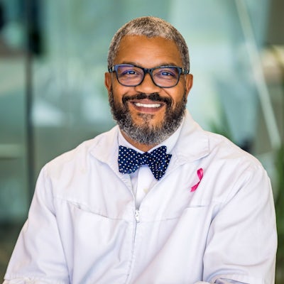 Dr. Elton Holden