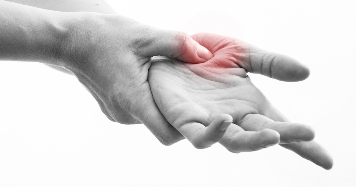 up close black and white female hands make acupressure point
