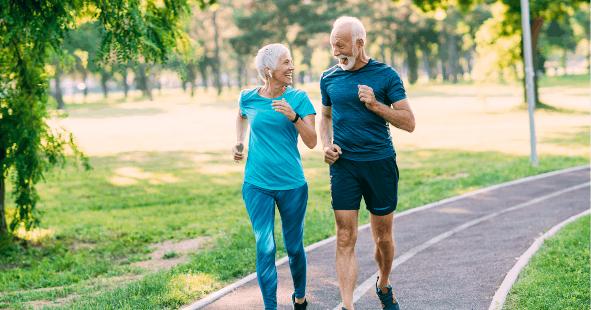Senior couple jogging at the park