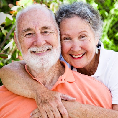 healthy happy senior elderly couple outside