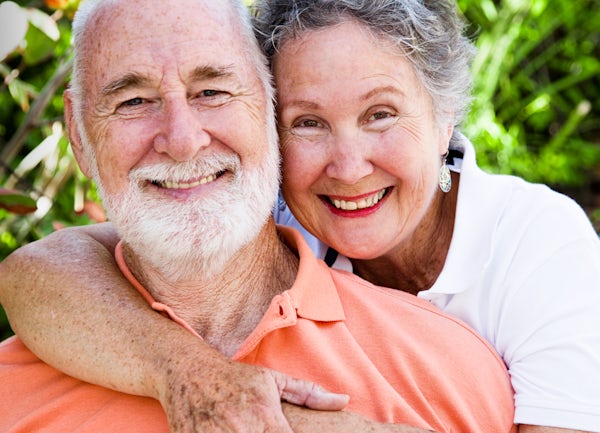 healthy happy senior elderly couple outside