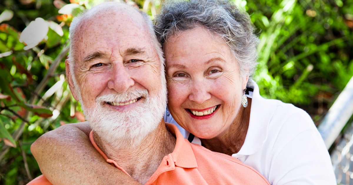 healthy happy senior elderly couple outside