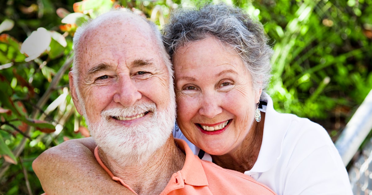 healthy happy senior elderly couple outside