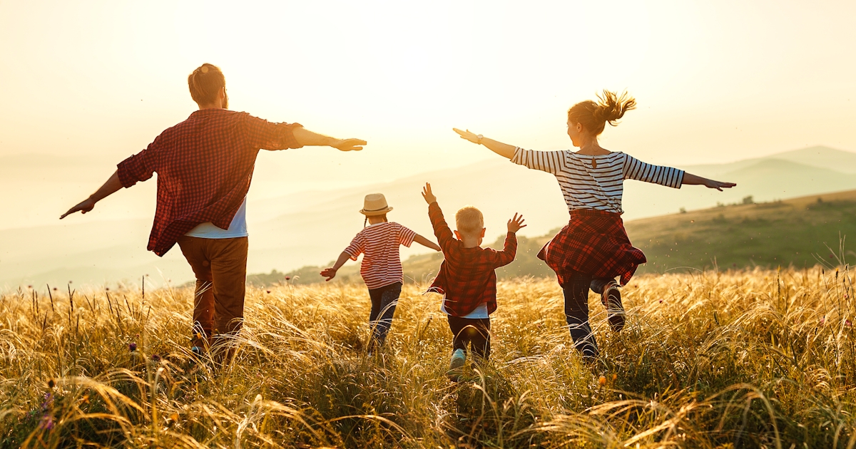 Happy family: mother, father, children son and dau