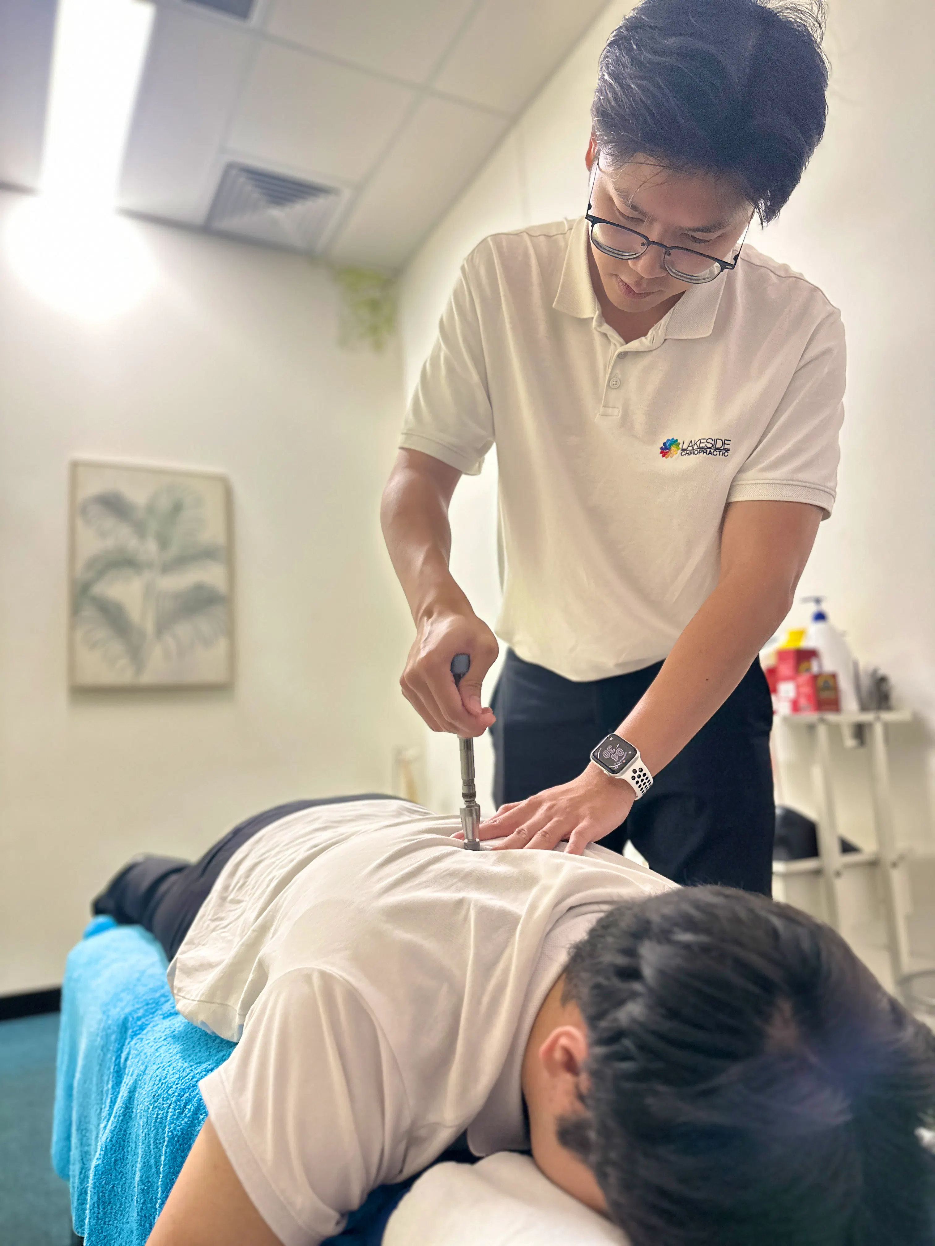 Lakeside Chiropractic clinician providing treatment to a patient