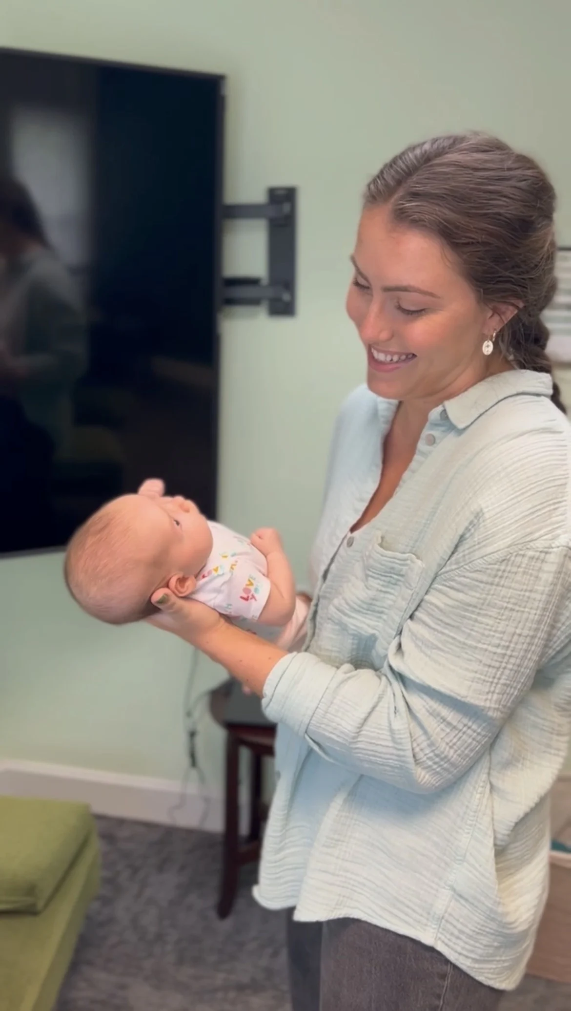 Dr. Simon performing chiropractic care on an infant, showing that Keystone Family Chiropractic cares for children in all stages of growth.