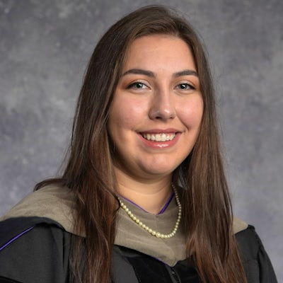 Graduation head shot of Dr. Jillian Corra practicing for Eyerly Chiropractic Offices
