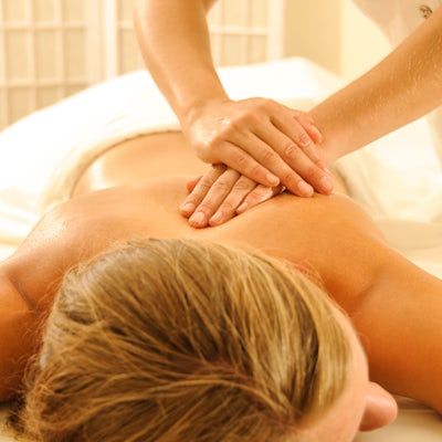 up close white female massage therapy female massage therapist