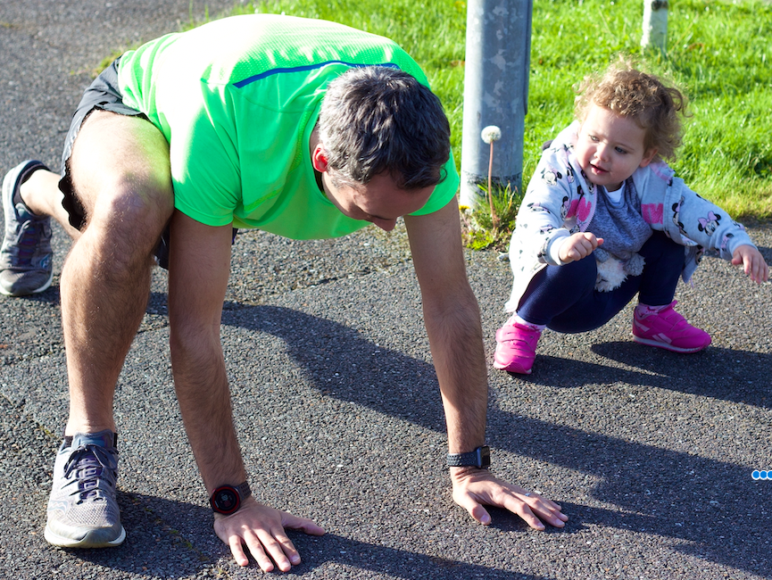 father with daughter beginning to run