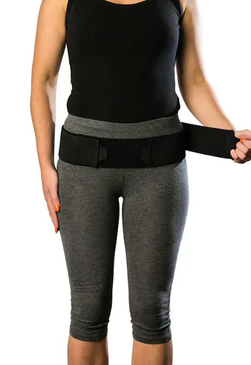 Person wearing the Allegro Ortho Core Stability Belt around the lower back and pelvis