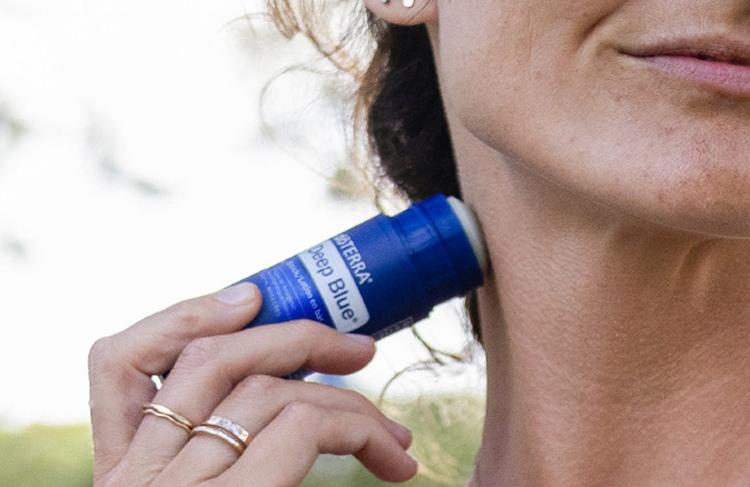 Deep Blue Stick being applied to the side of the neck