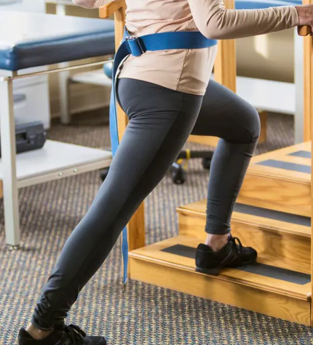 Patient performing rehabilitation exercises for spondylolisthesis and lower back instability