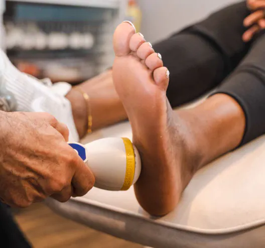 Clinician treating the underside of the heel