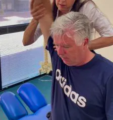 Lakeside Chiropractic clinician assessing shoulder mobility