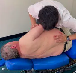 Lakeside Chiropractic clinician providing gentle hands-on care to an older patient