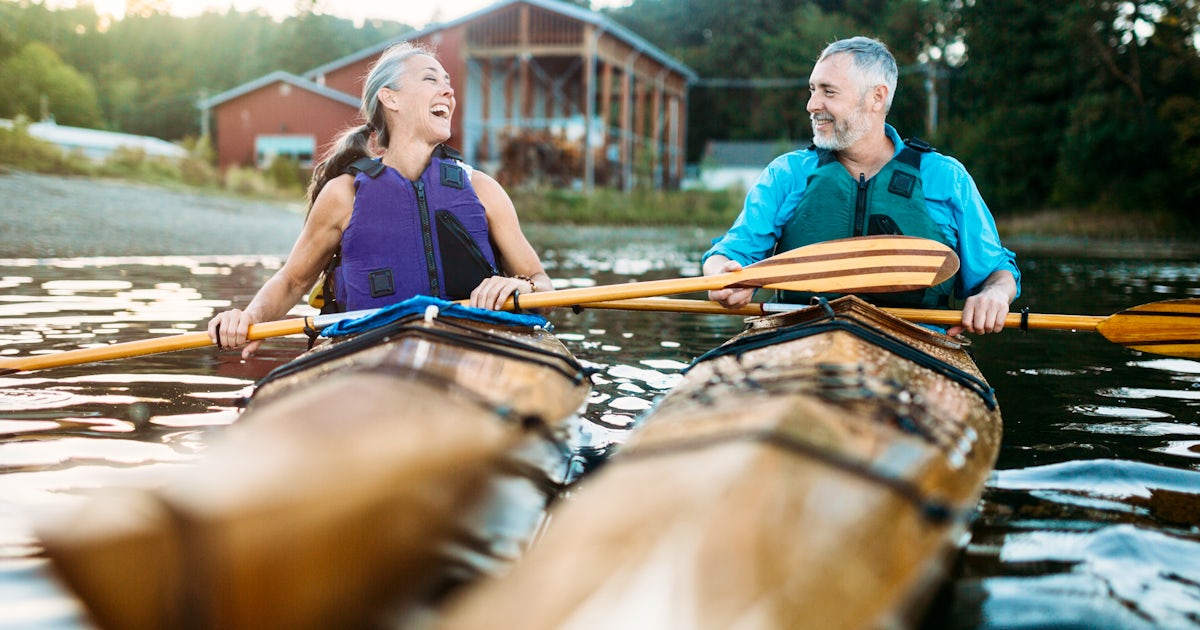 Mature Couple Has Fun Kayaking