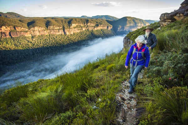Senior Couple Bushwalking in Spectacular Blue Moun