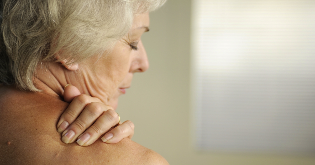 senior with neck pain