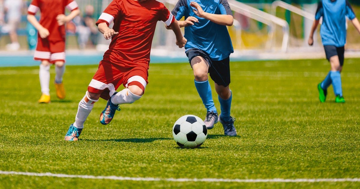 Football Soccer Players Running with Ball. Footbal