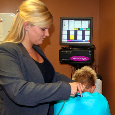 chiropractor adjusting patient