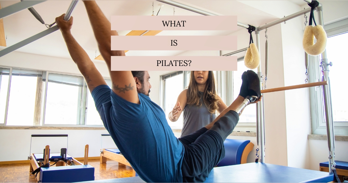 The image shows a person practicing Pilates on a reformer while an instructor offers guidance. Bright studio with large windows is visible.