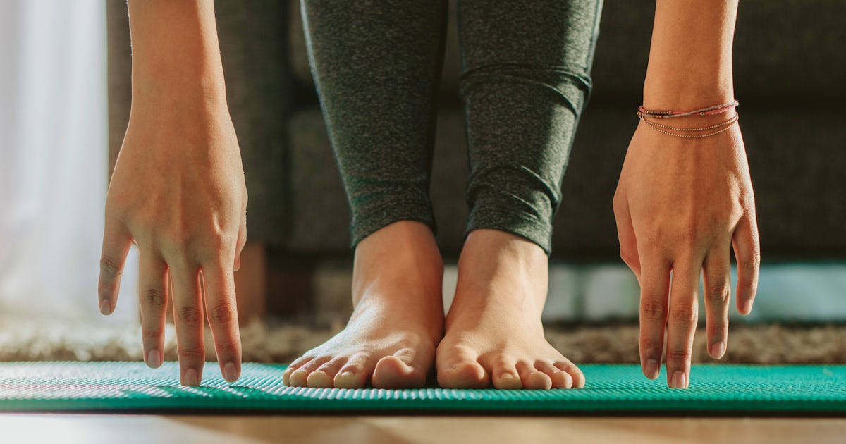 Girls hands and feet during yoga workout