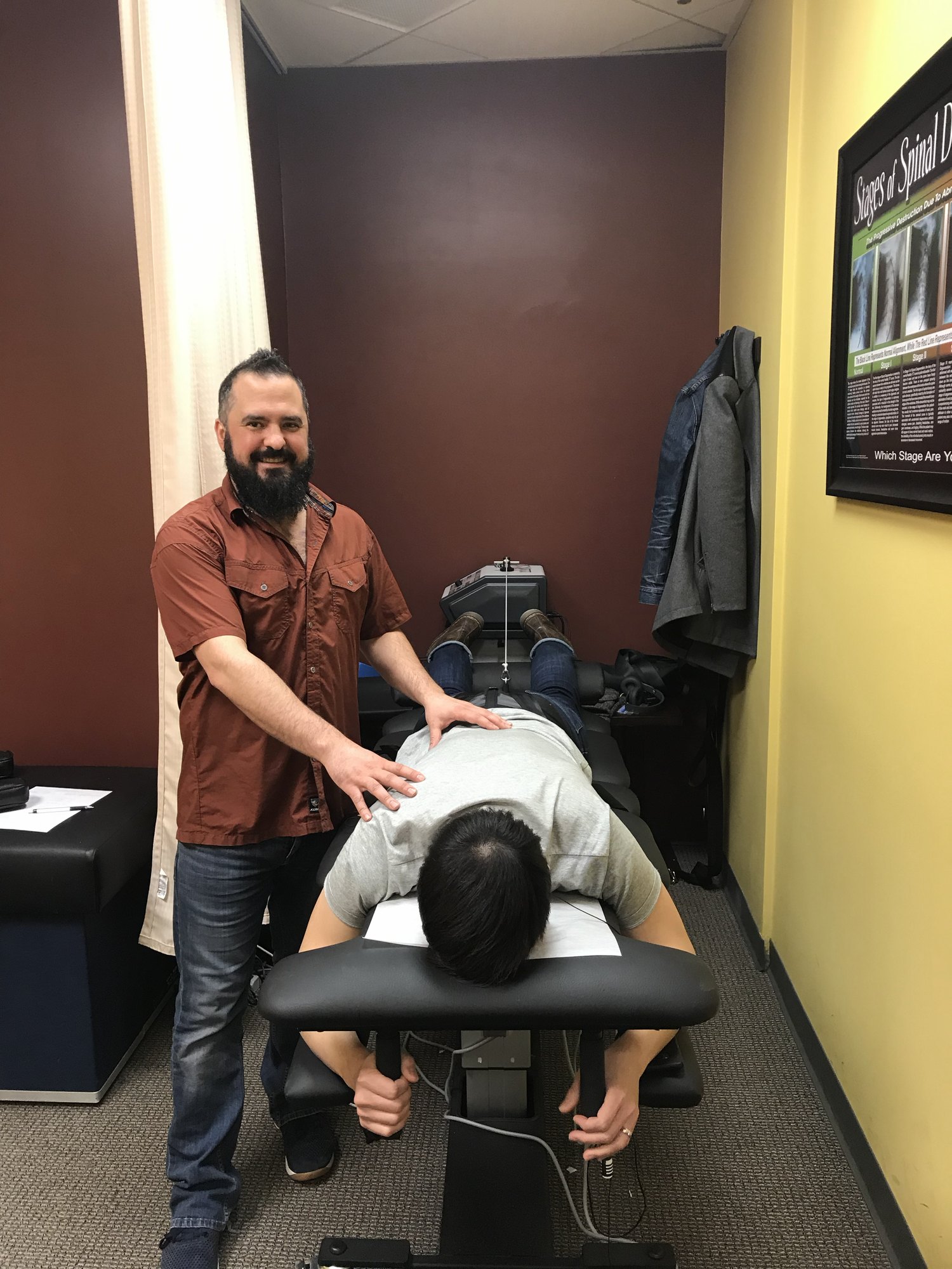 Patient receiving hands-on care on a treatment table at Boundless in Bottineau