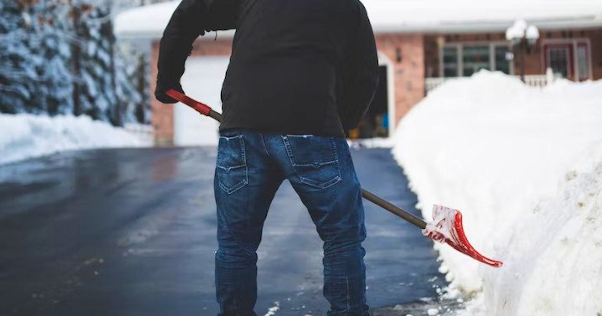 man shoveling snow