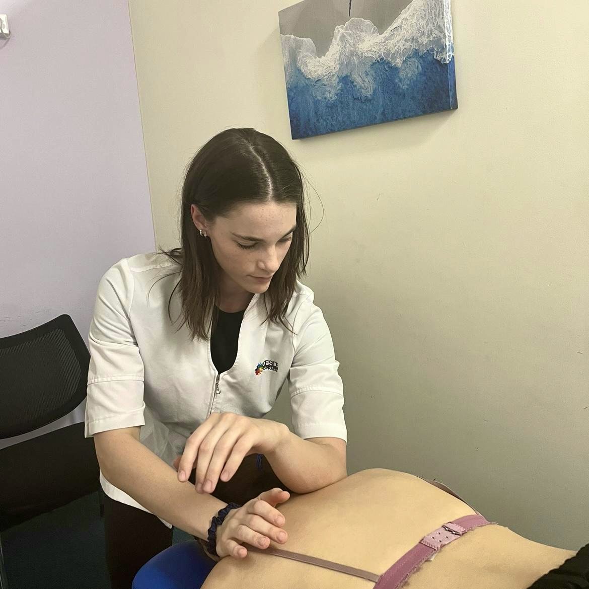 Natalie uses her elbow during massage therapy at Lakeside Chiropractic
