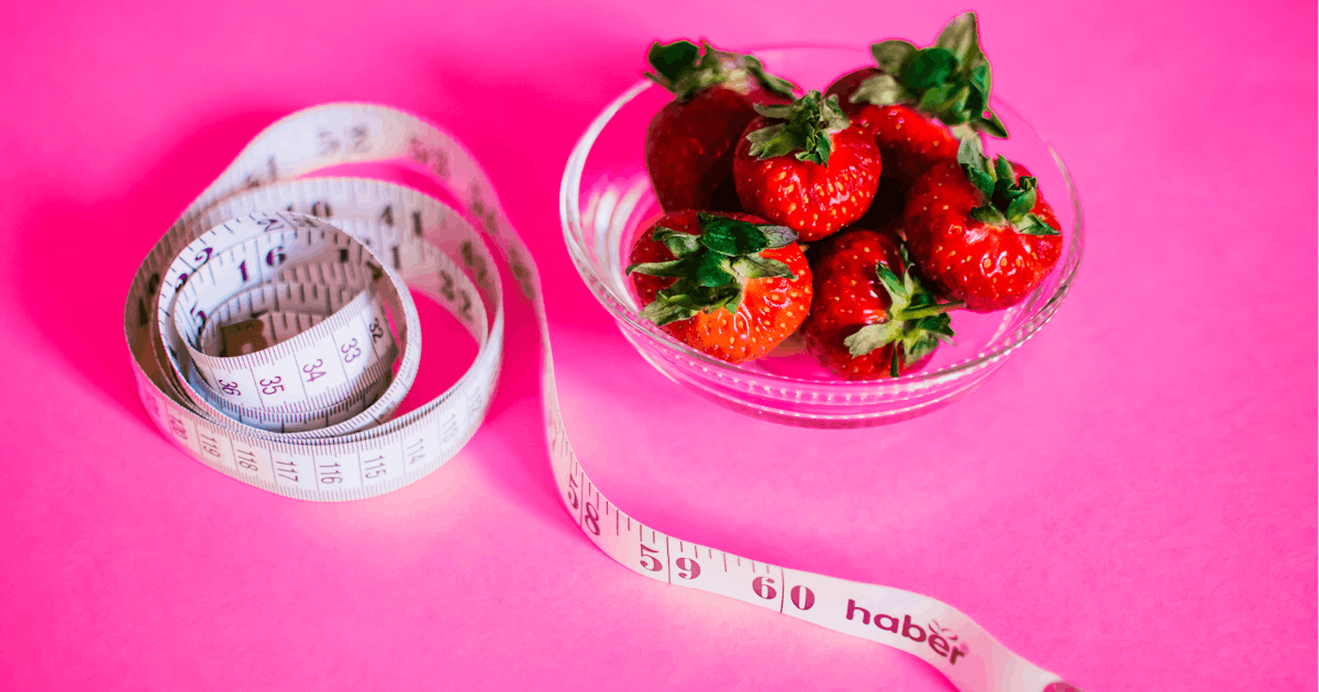 tape measure and strawberries