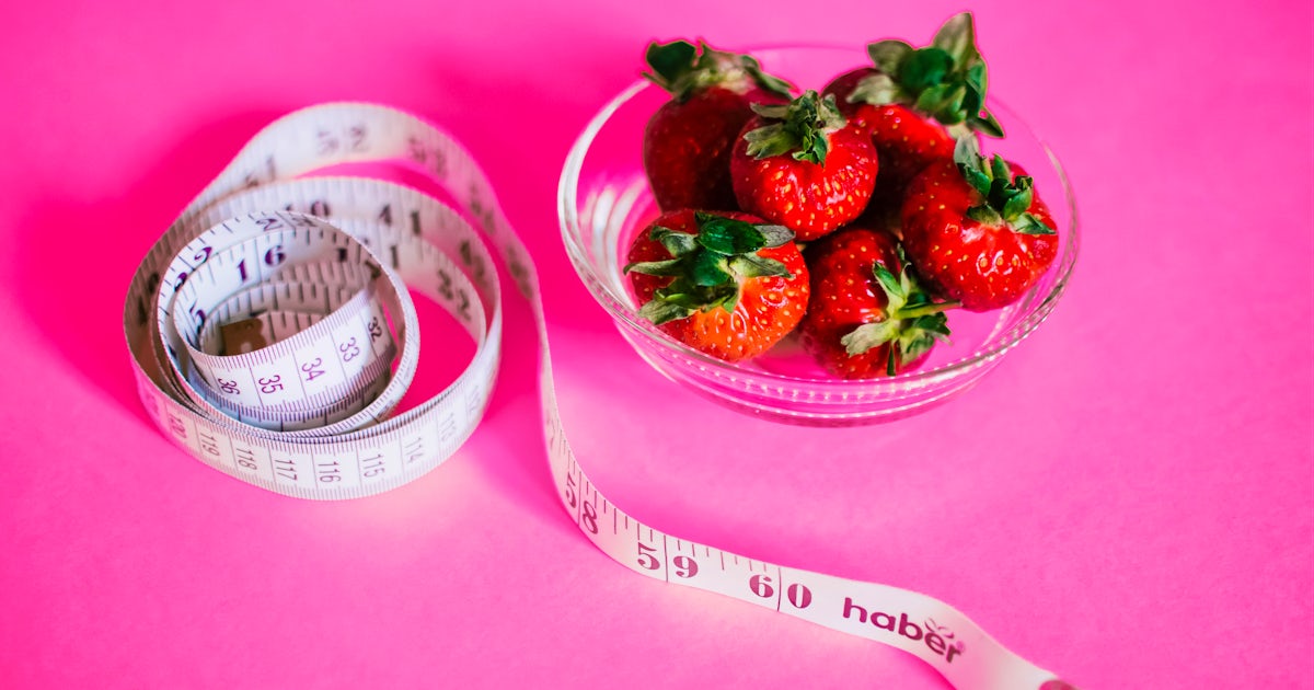 tape measure and strawberries