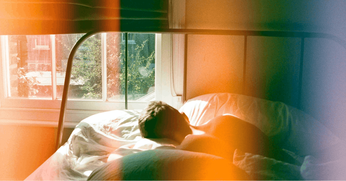 person in bed