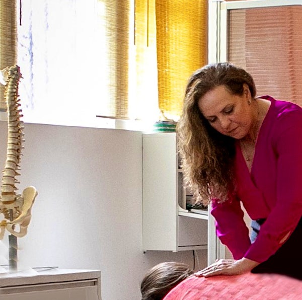 chiropractic adjustment on pregnant woman