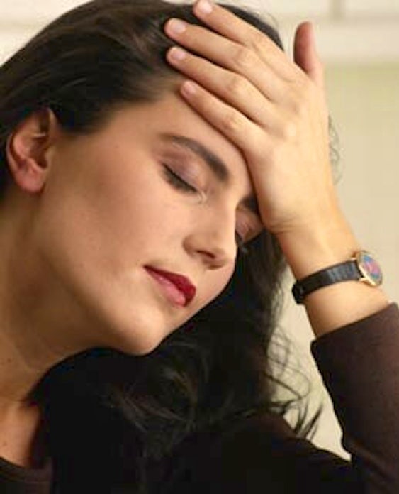 woman_experiencing_a_headache